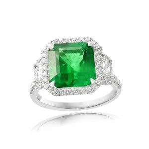 Platinum Diamonds Three Stone Design With Step Cut Trapezoid Diamonds And Halo Cocktail Ring