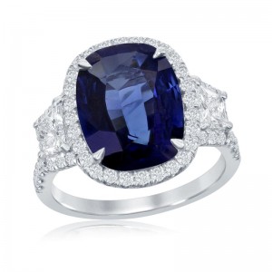 Platinum Three Stone Design With Trapezoid Cut Side Stones And Halo Cocktail Ring