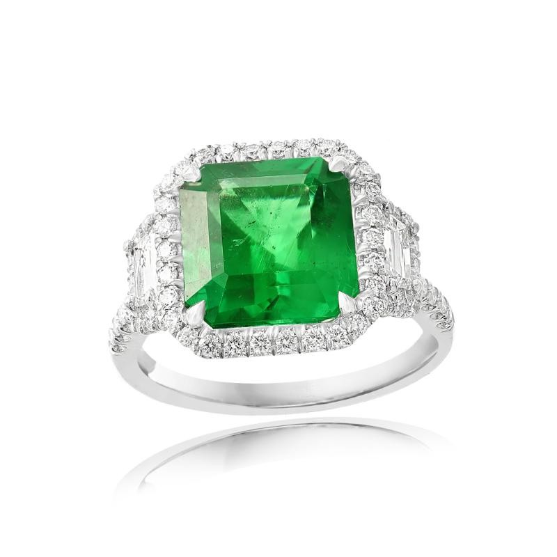 Platinum Diamonds Three Stone Design With Step Cut Trapezoid Diamonds And Halo Cocktail Ring