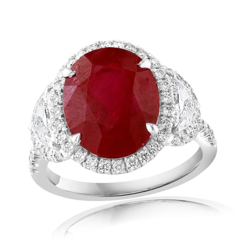 Platinum Three Stone Design With Half Moon Cut Diamond Side Stones And Halo Cocktail Ring